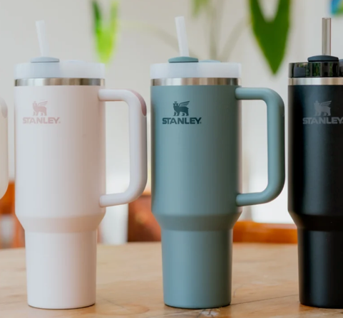 Corporate gifts by generation: Stanley cup for Gen Z next to tool kit for Baby Boomers