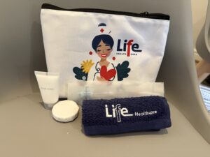 Branded wellness kits packaged as corporate gifts by Fancy Inc